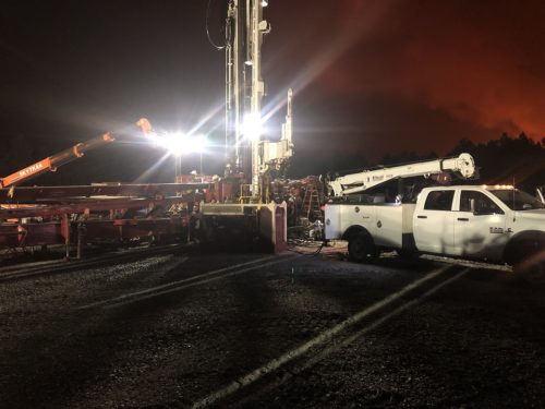 running part of a downed rig with our service truck